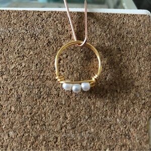 Handmade gold and white worry ring in size 6